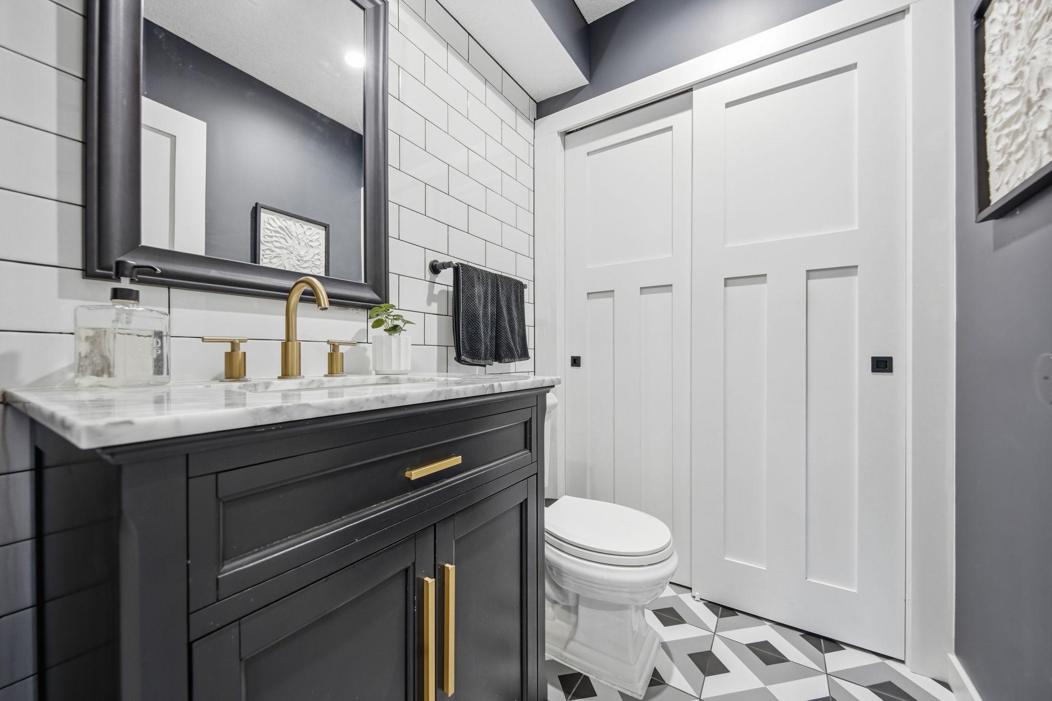 Elegant Powder Room with possible closet conversion into shower (pre-plumbed)