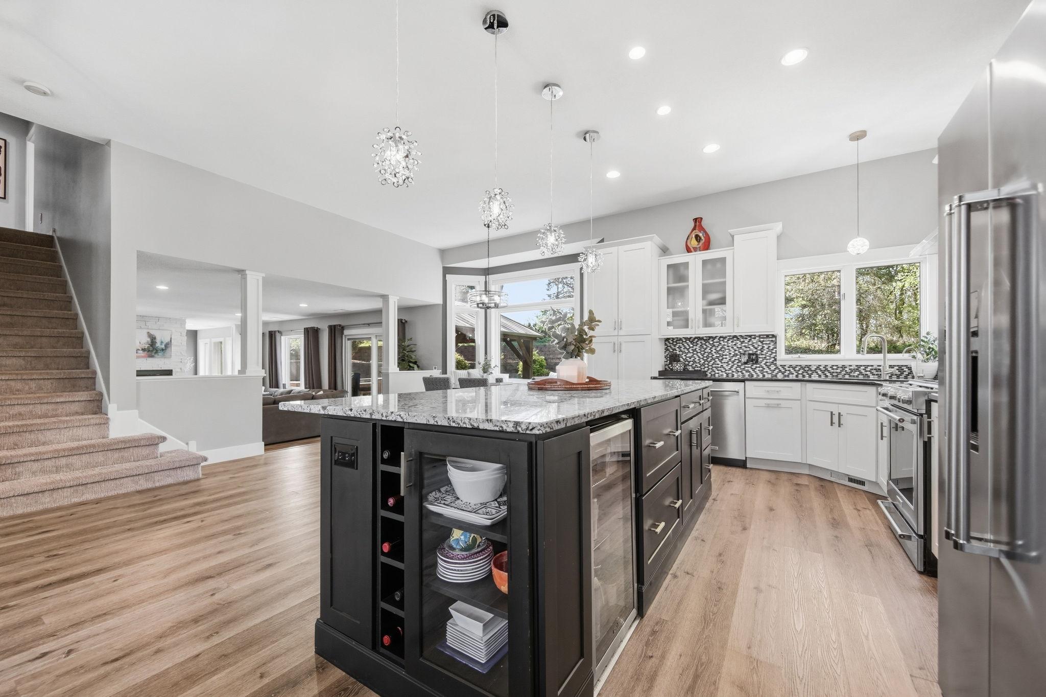 Island is adorned with wine rack and nooks