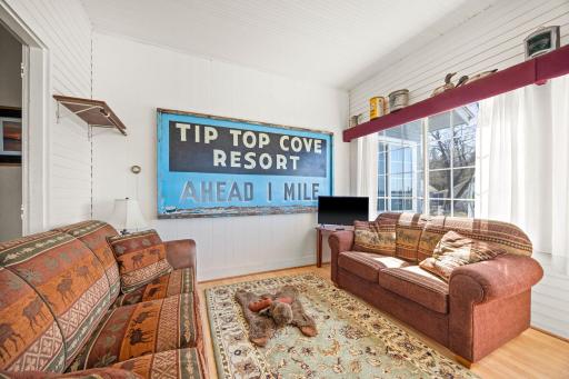 The other end of the dining room hosts a cozy den