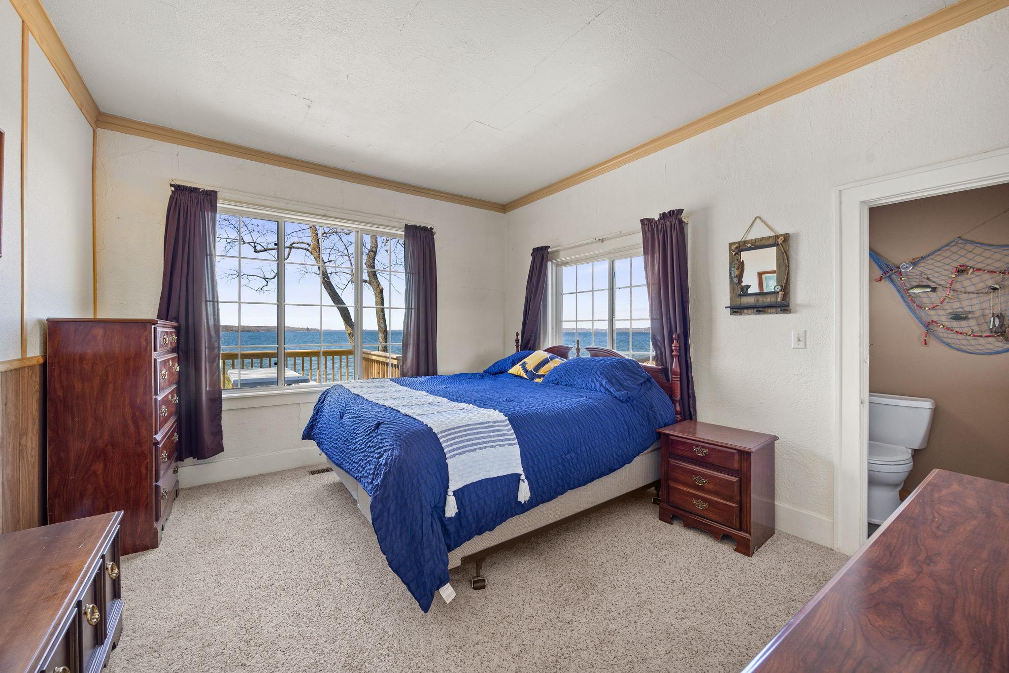 Lakeside primary suite with 1/2 bath