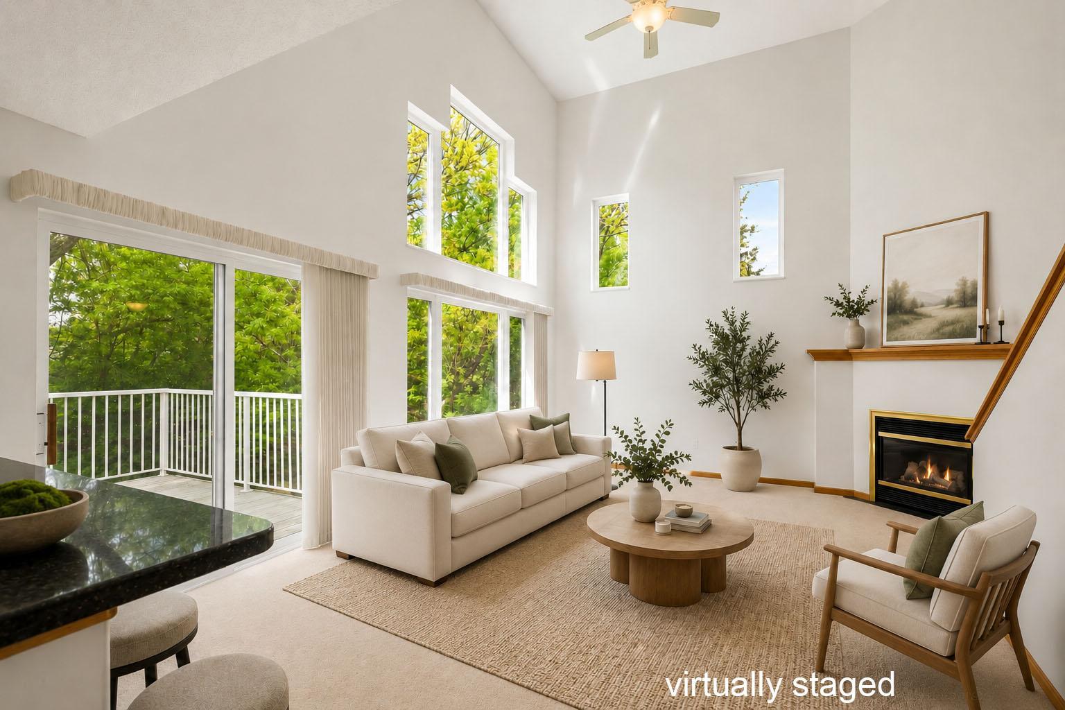 Virtually Staged - bright, stunning living room with a vaulted ceiling and big windows