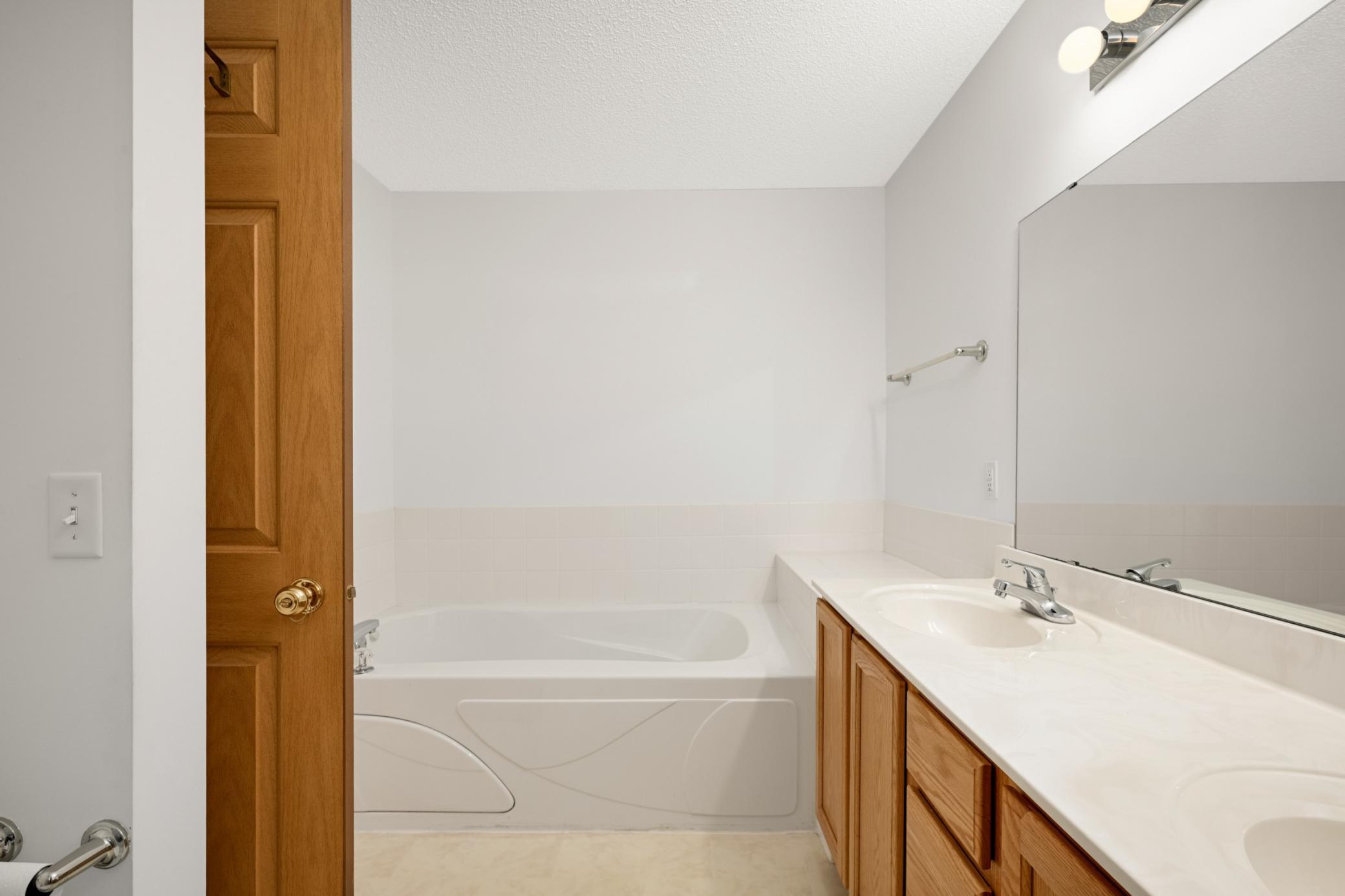 Large soaking tub in the primary bathroom