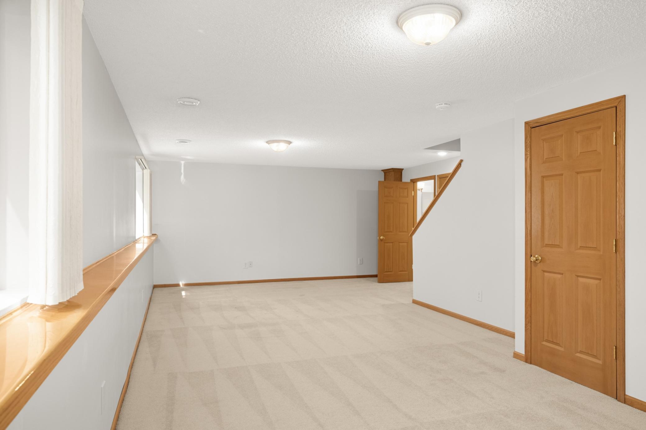 Relax in the spacious lower level family room