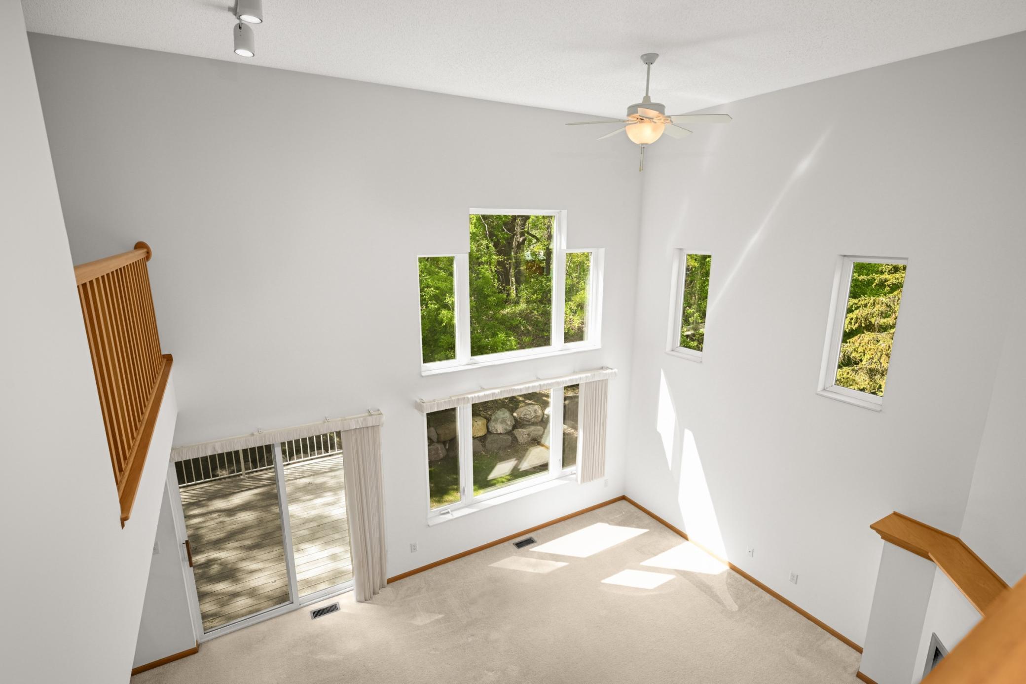 View from the upper level down to the gorgous main level living room