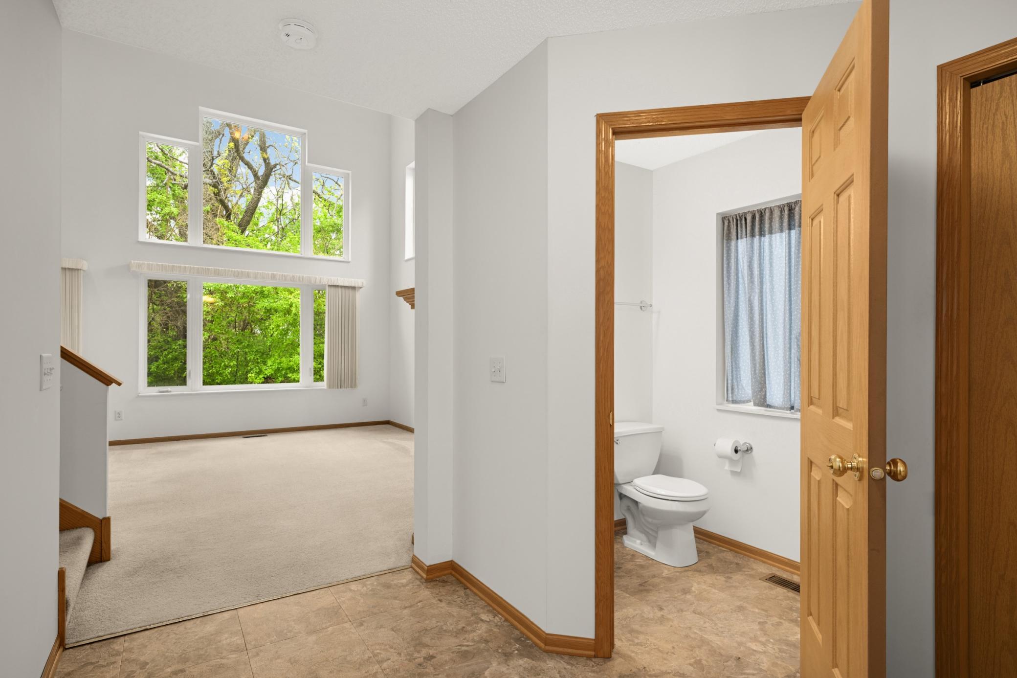 The main level also features a half bath off the front entryway
