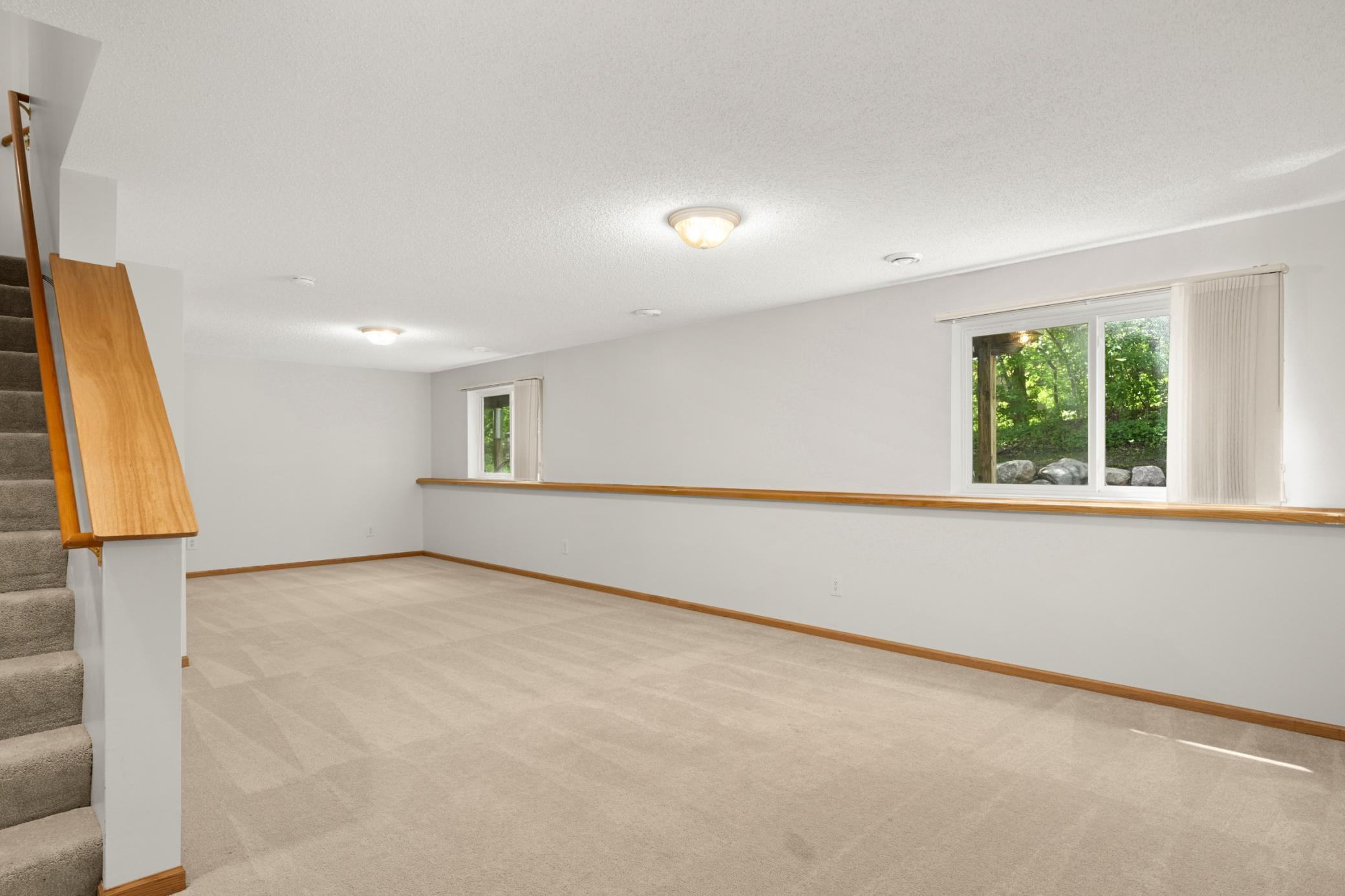 Relax in the spacious lower level family room