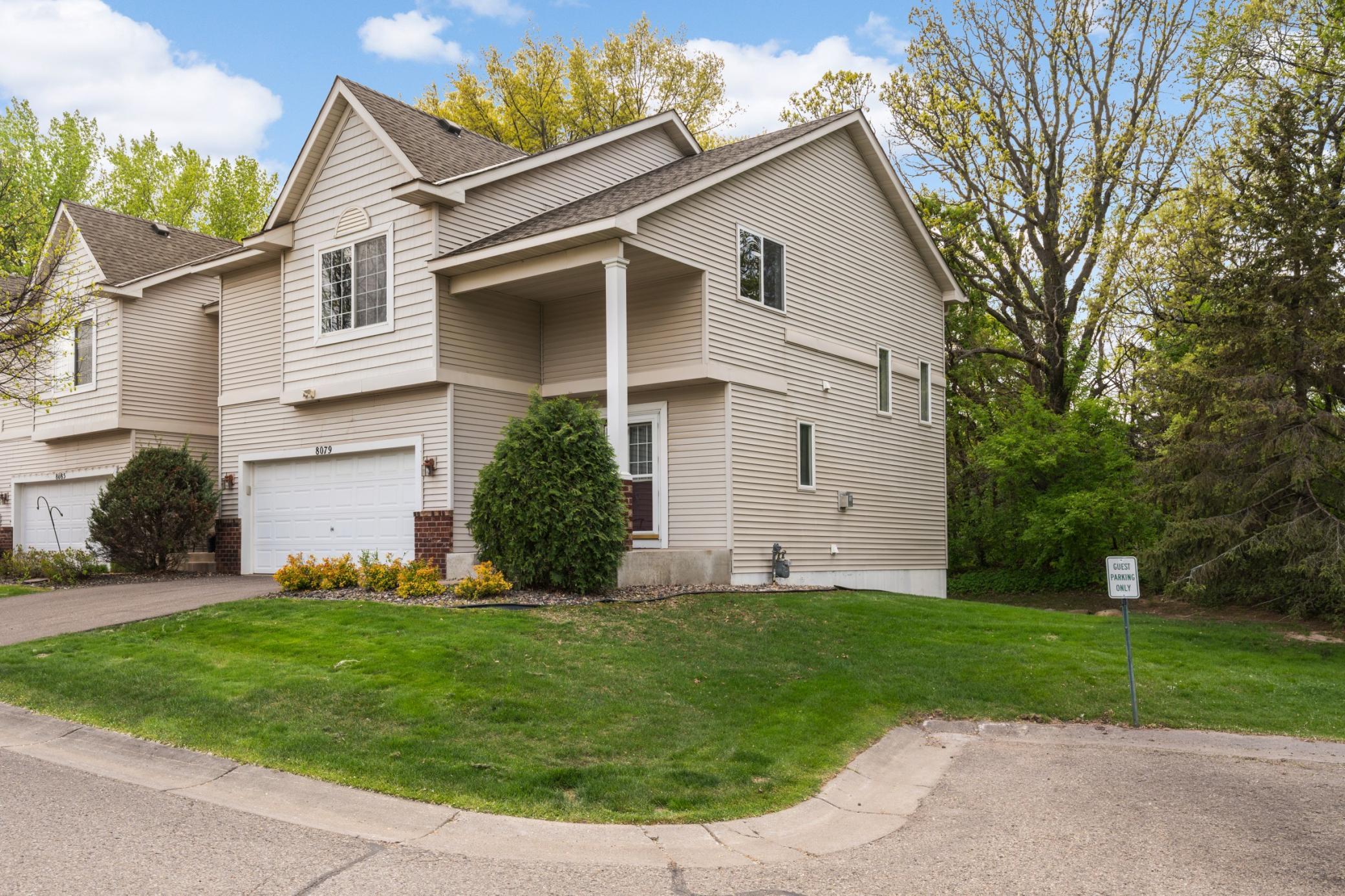 You'll love the privacy of this end-unit townhome