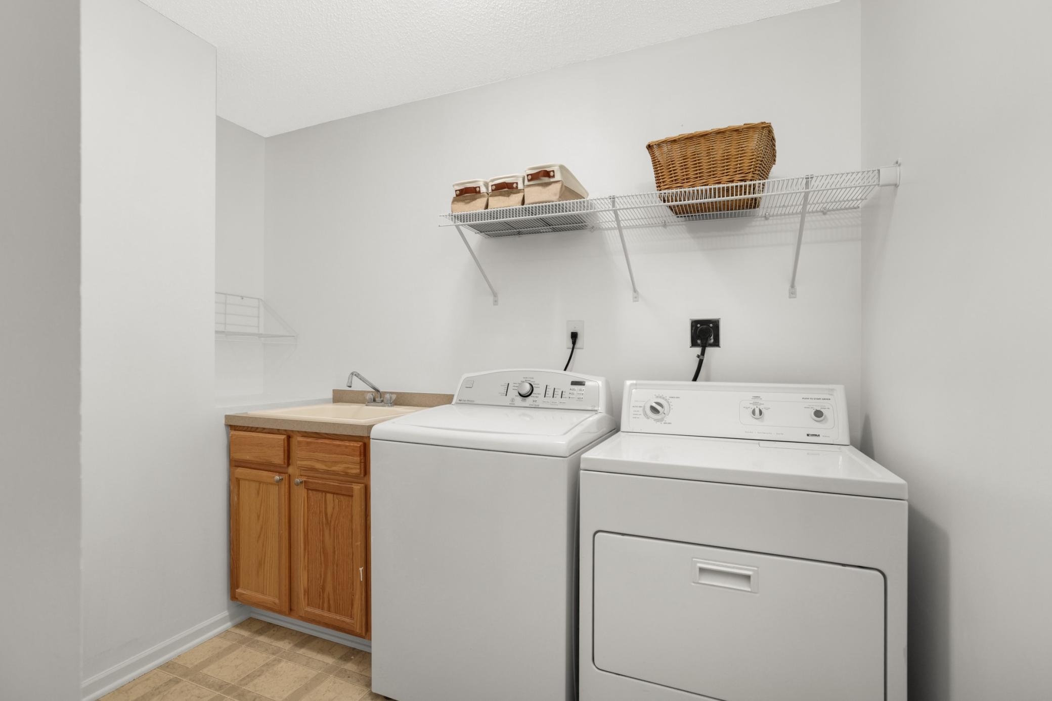 Upper level laundry with lots of storage
