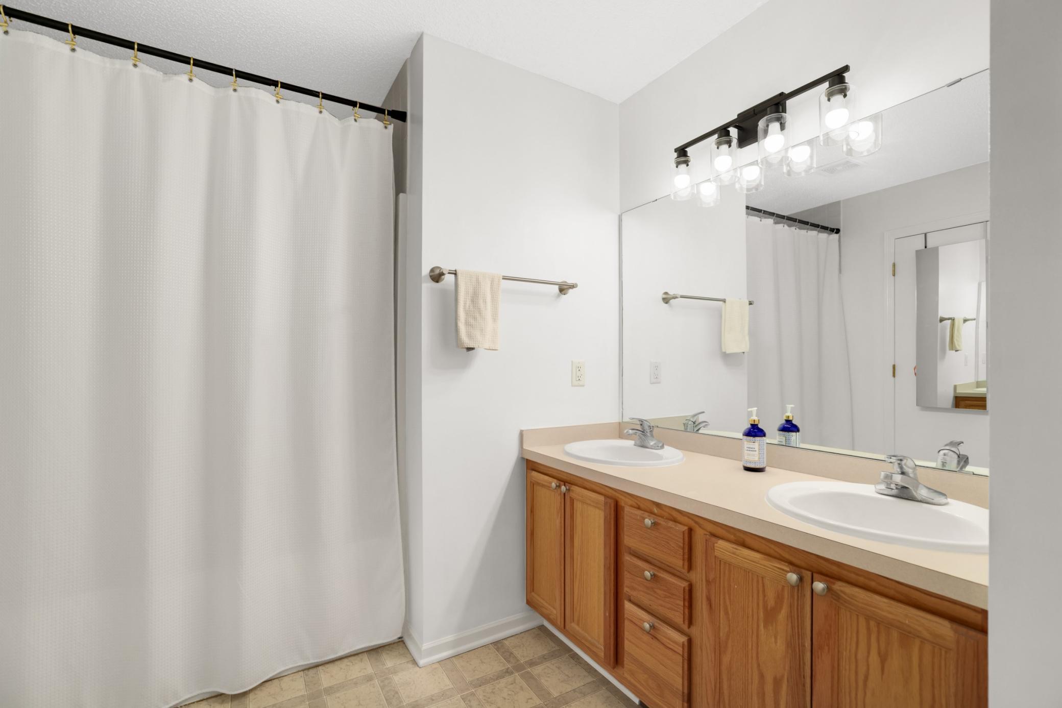 Large full bath with dual sinks