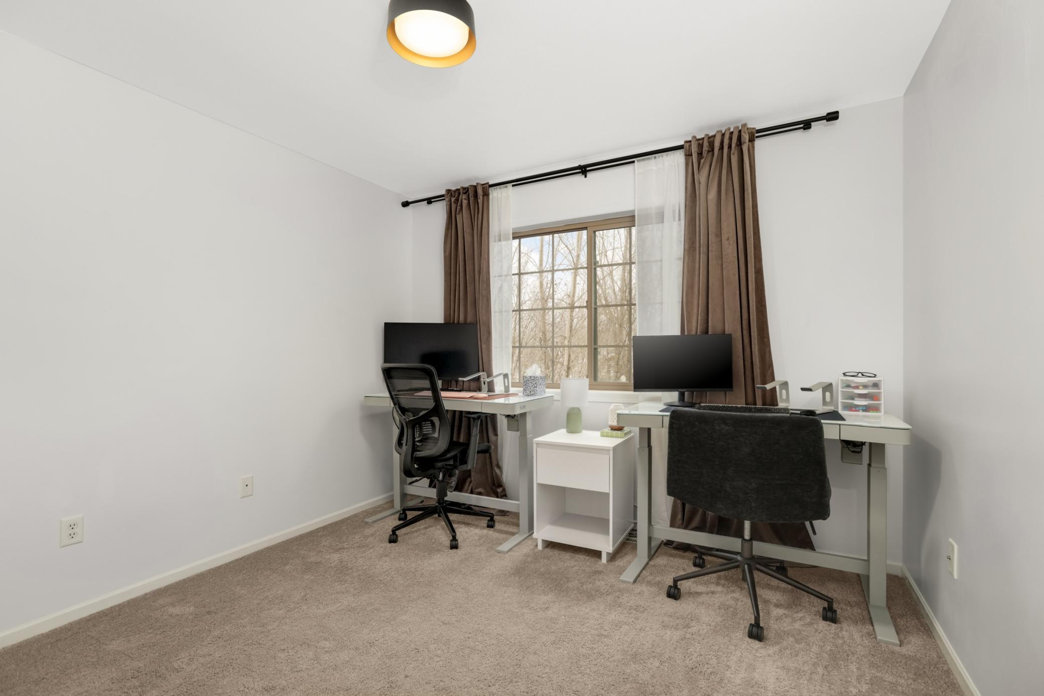 Second bedroom offers treetop backyard views