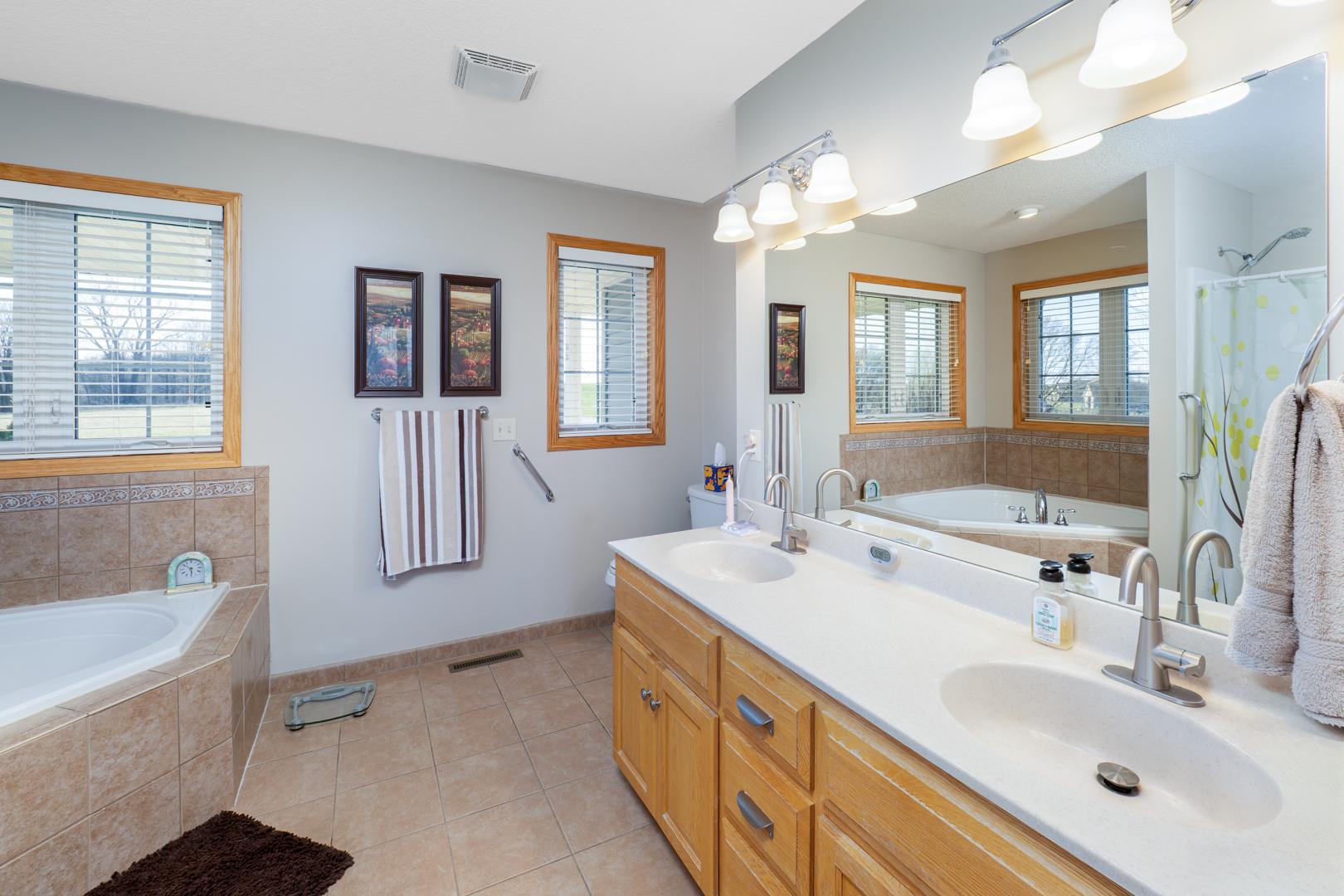 Primary bath with whirlpool tub and separate shower