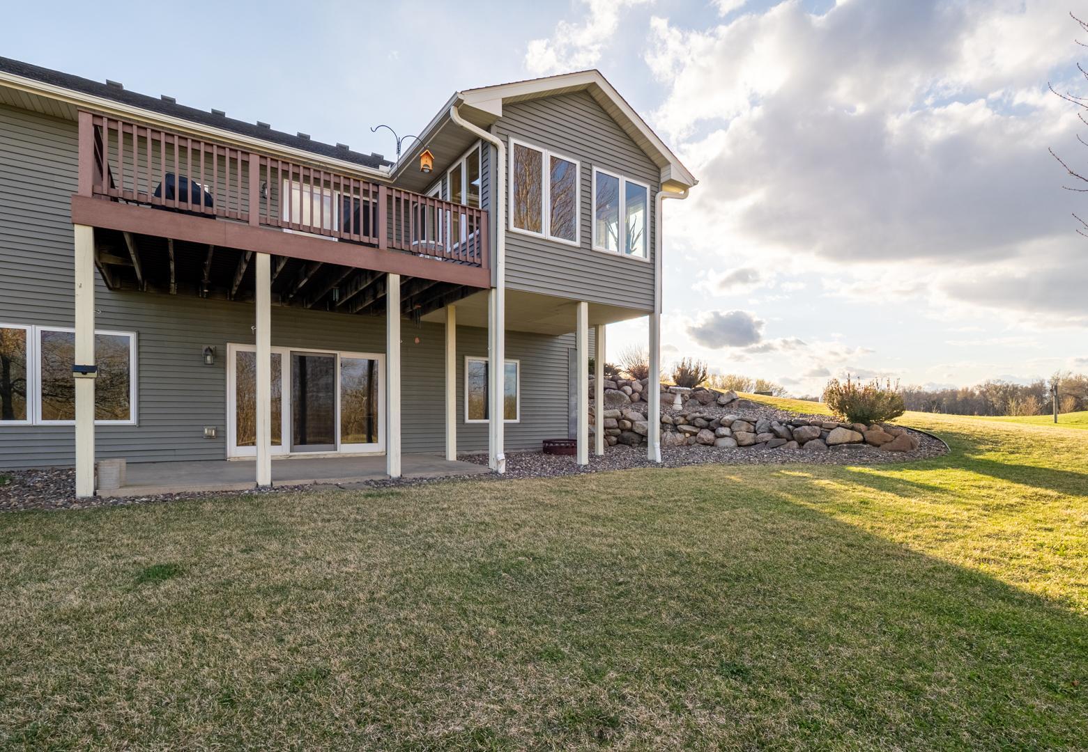 View of sunroom and deck