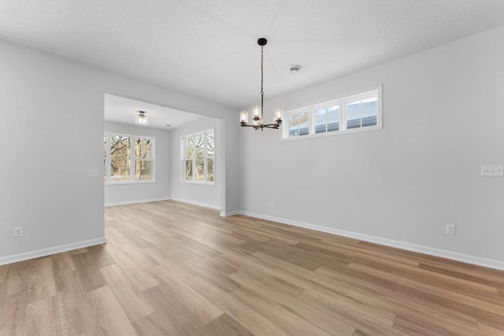 Open And Inviting Dining area and Sunroom-representational
