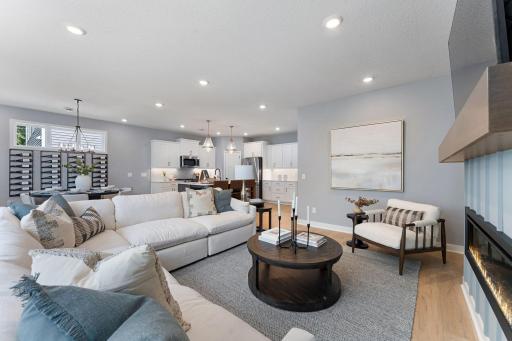 Large Family Room features LVP flooring - similar home- finishes vary