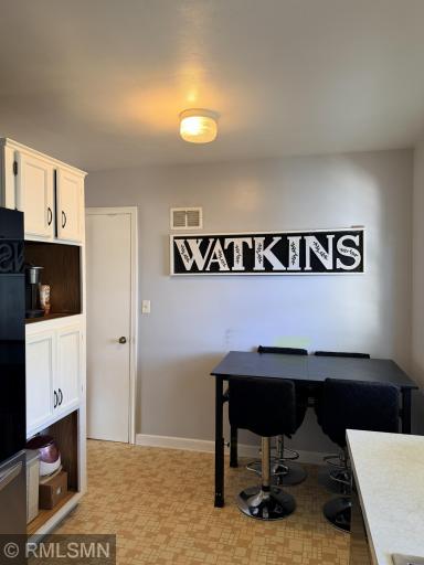 Nice pantry space behind the door off of the eat-in kitchen