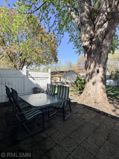 Shaded and inviting fully fenced back yard!