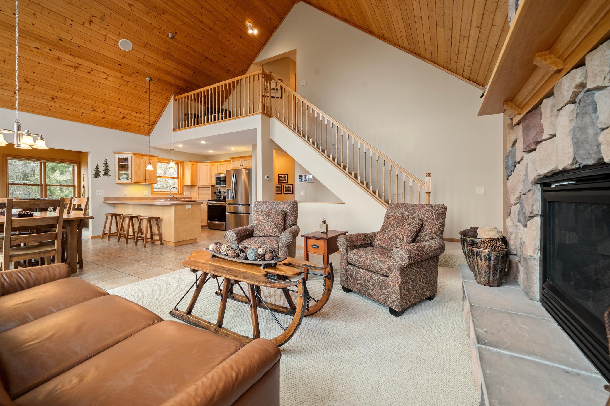 Soaring two-story vaulted ceiling makes this space feel even more spacious and open