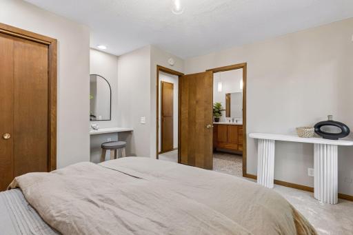 Bedroom #2 with vanity or desk nook and walk thru bath.