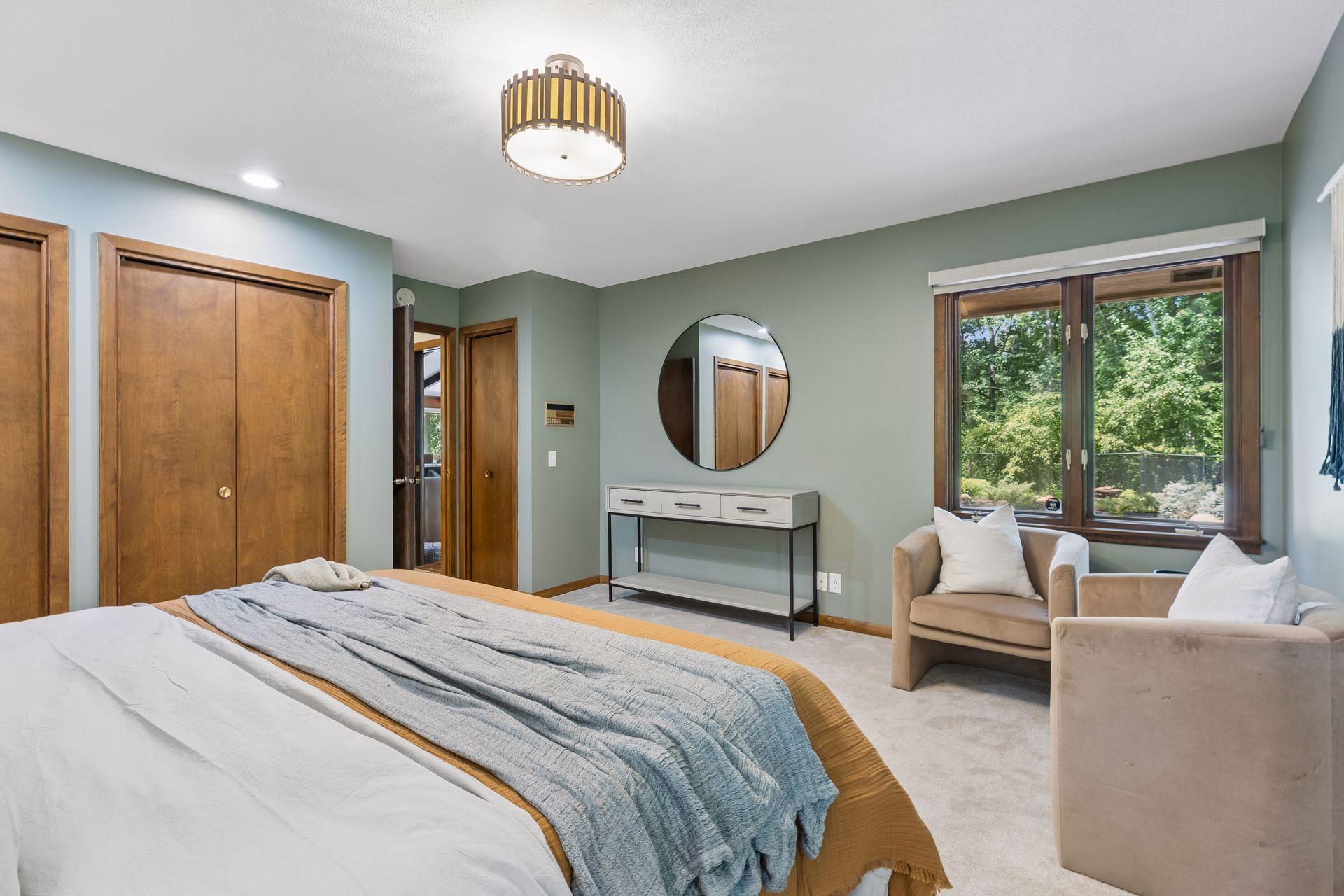 Primary bedroom with double closets.