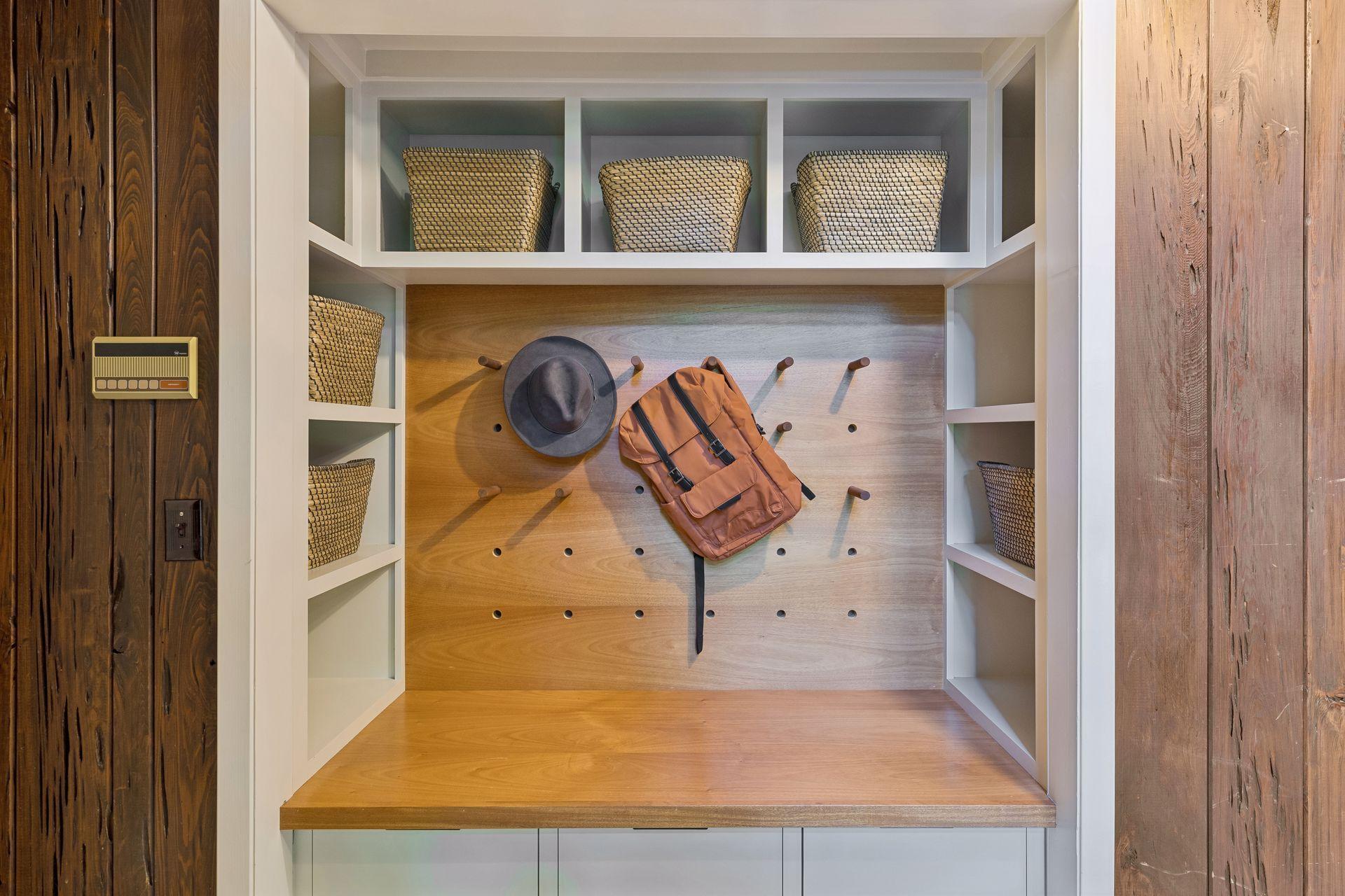 Custom built bench in mudroom.