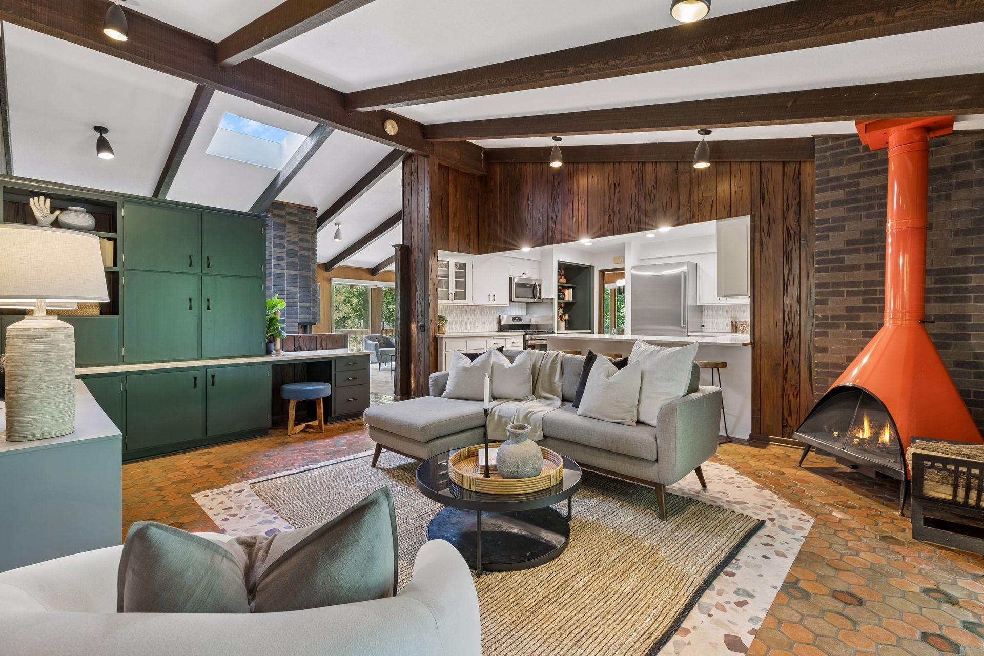 Built-ins in family room. Quintessential MCM fireplace.