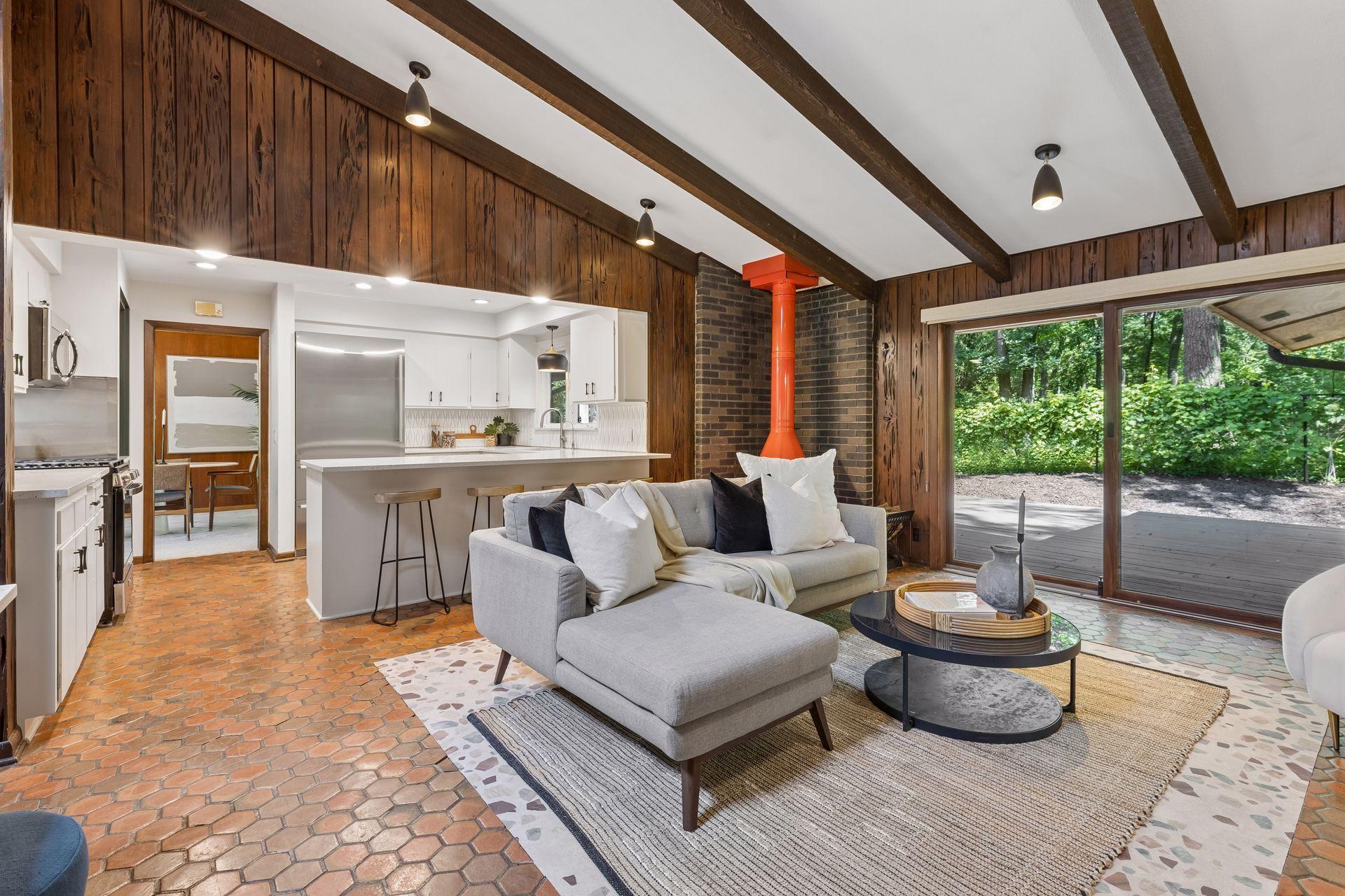 Kitchen opens to family room. Walk out to backyard deck.