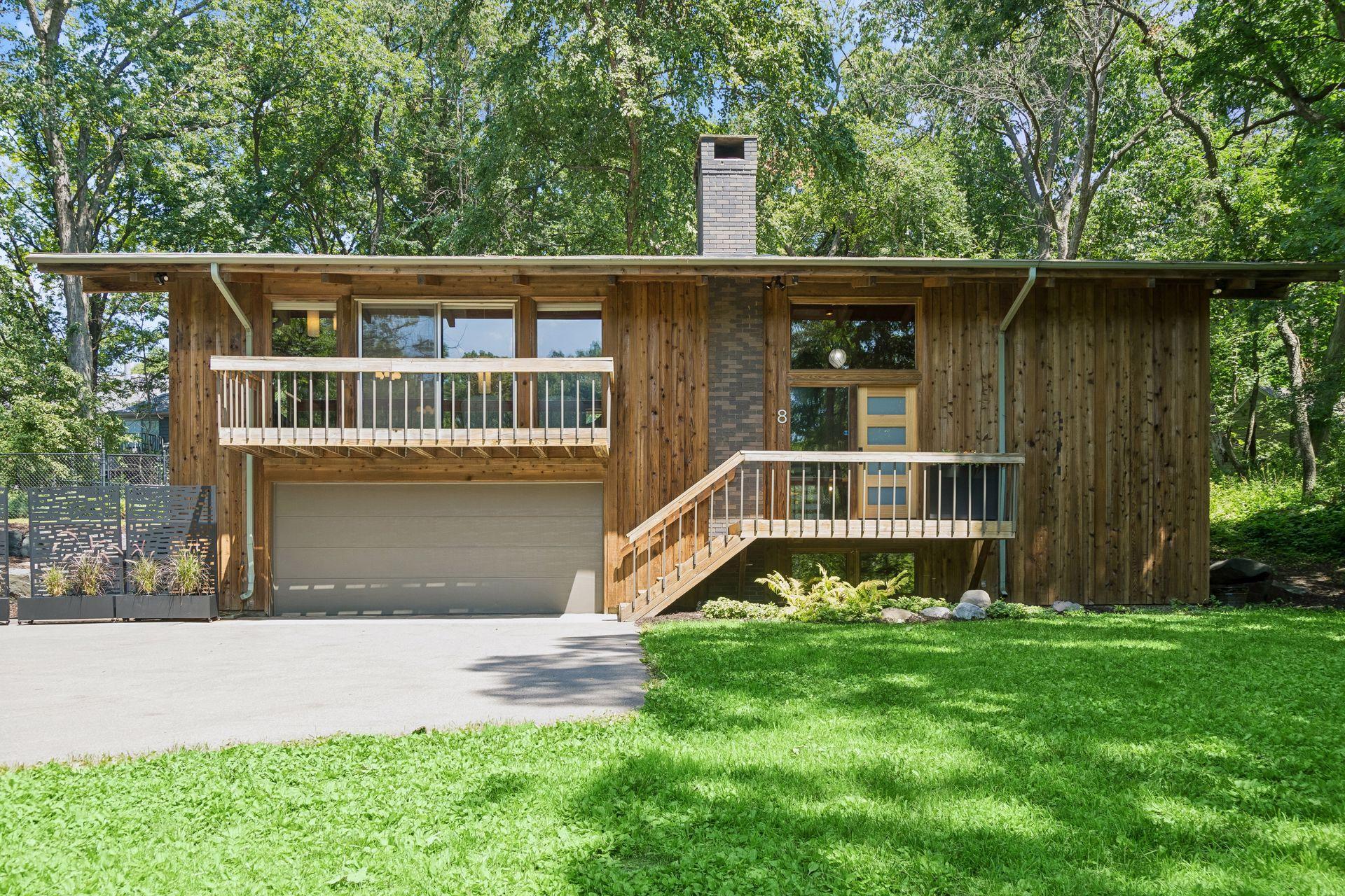8 Sand Piper Lane. Cedar siding recently cleaned. New mahogany front door and hardware.