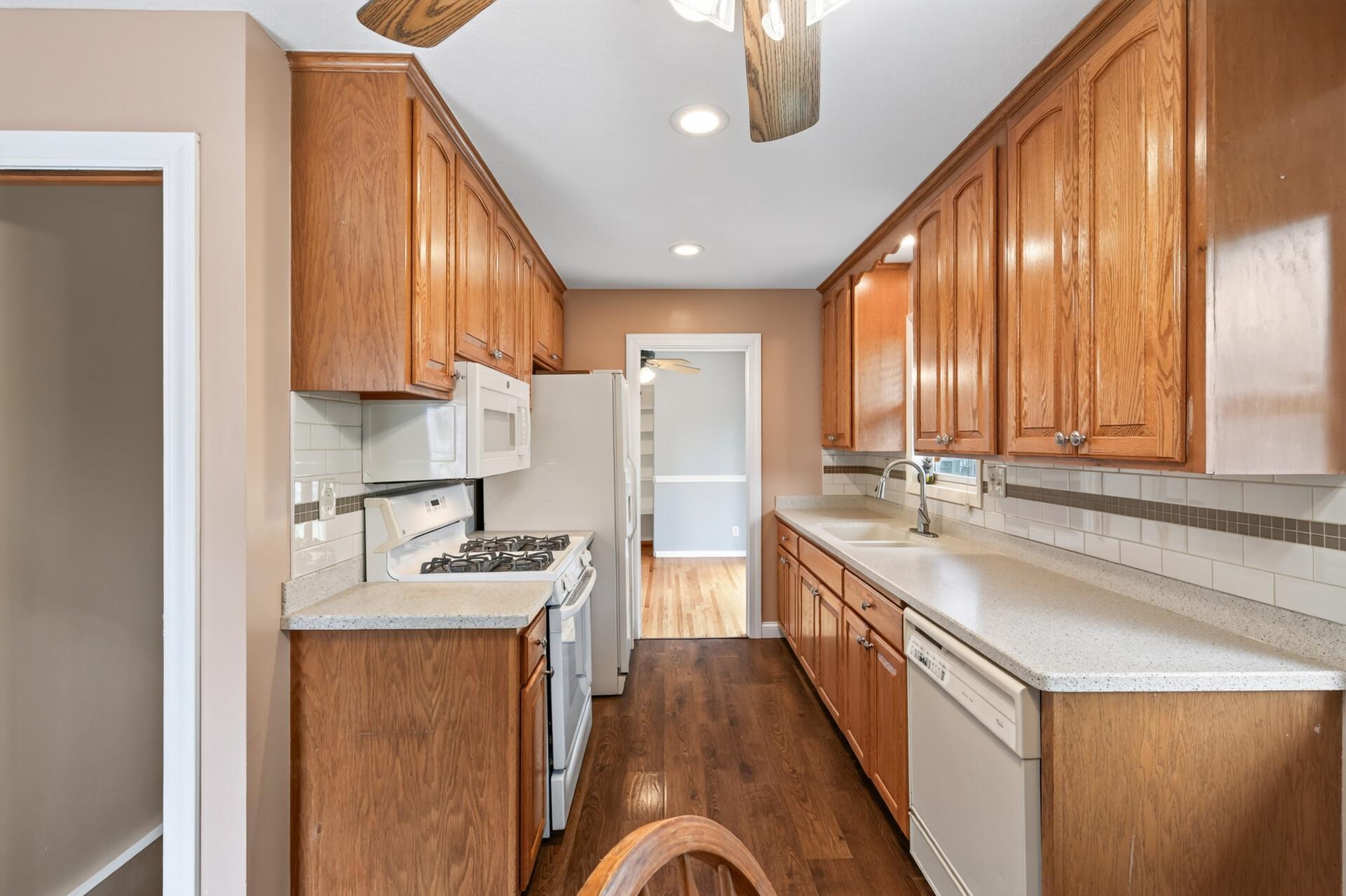 Main level has your kitchen, family room, a large dining room, 2 bed rooms, a full bath that all walks out to your deck!