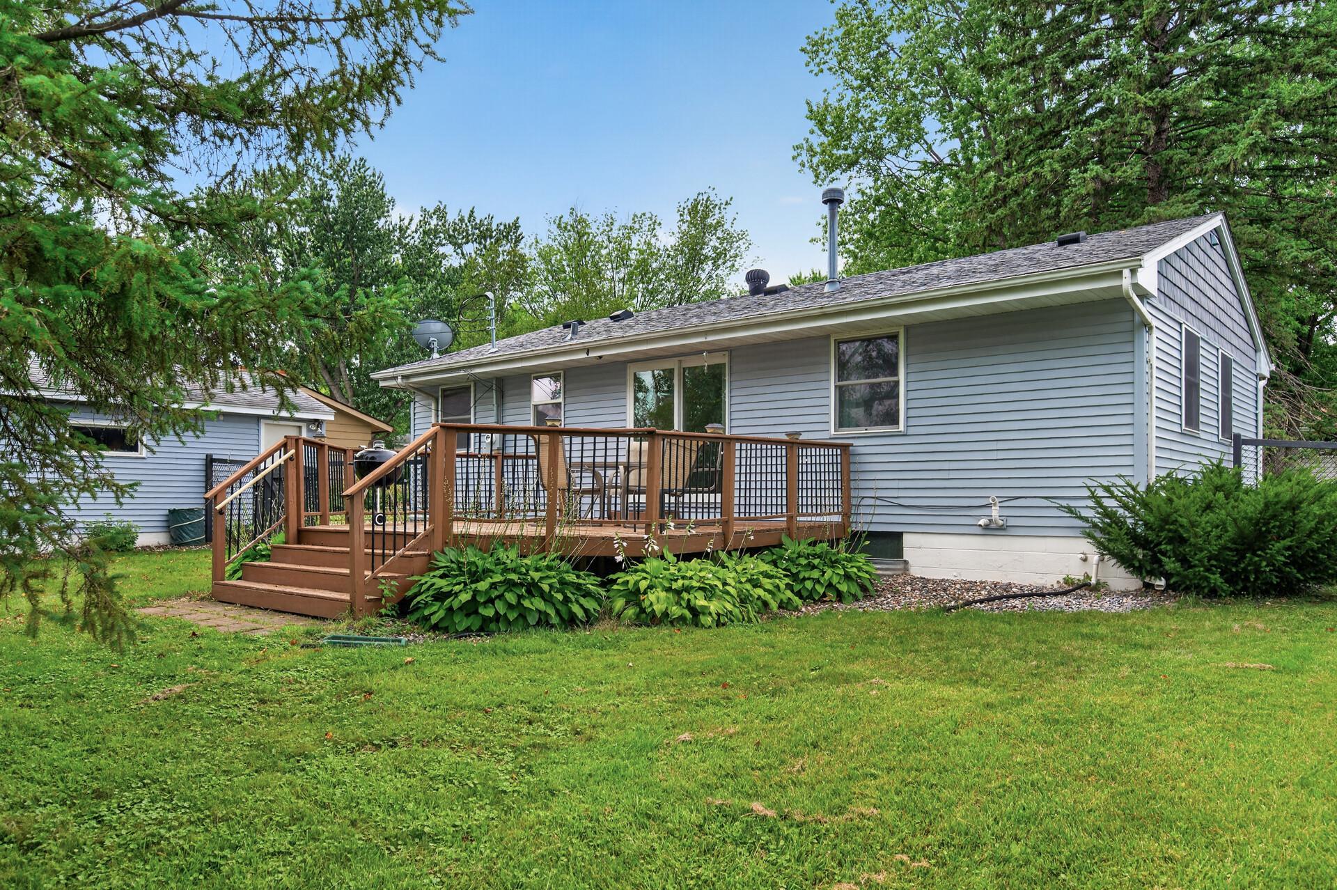 Backyard is fully fenced, has a storage shed and large deck!