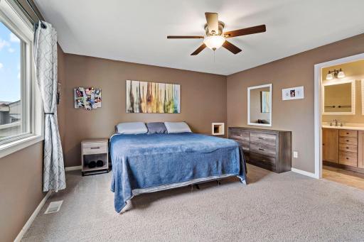 Owners suite with walk in closet and private bath.