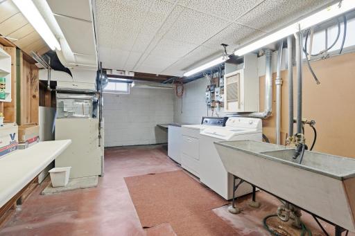 Laundry/Mechanical room, complete with utility sink.