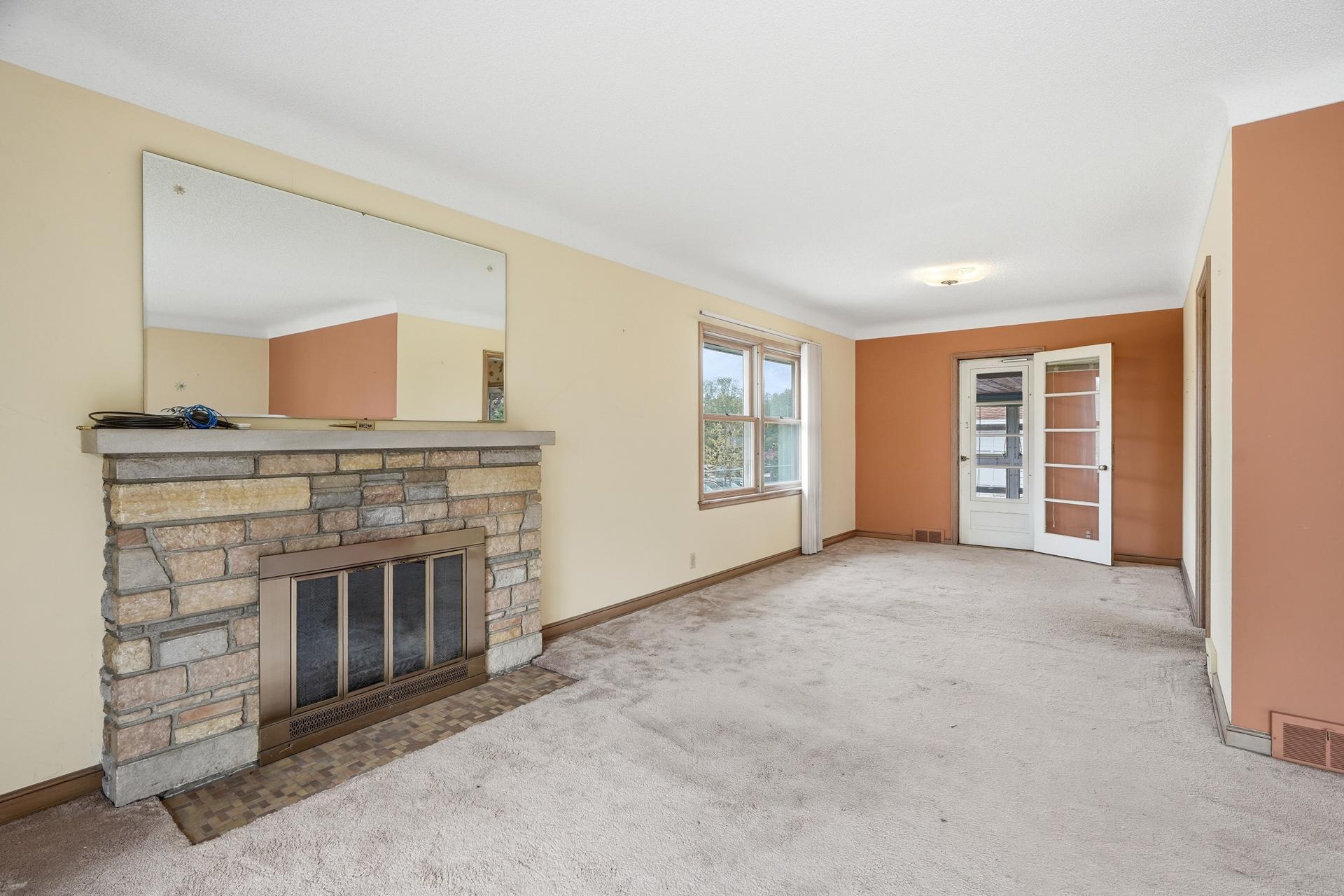 Wood-burning stone fireplace has not been used for years, and is not deemed to be in working order.