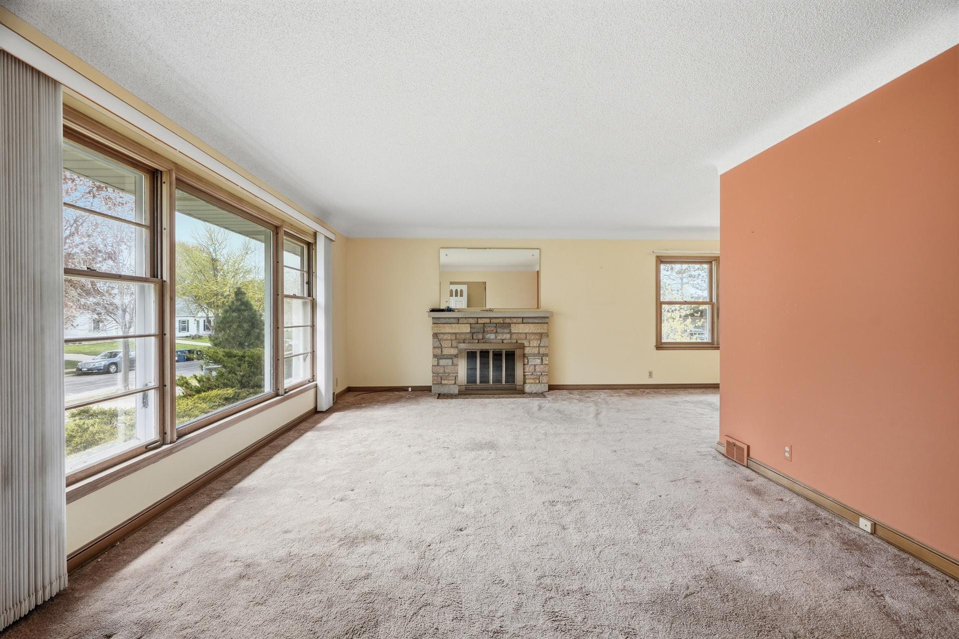 Original hardwood floors under carpet living & dining rooms. Only 2 rooms with popcorn ceilings.