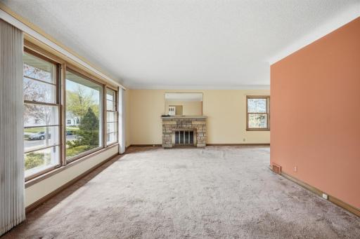 Original hardwood floors under carpet living & dining rooms. Only 2 rooms with popcorn ceilings.