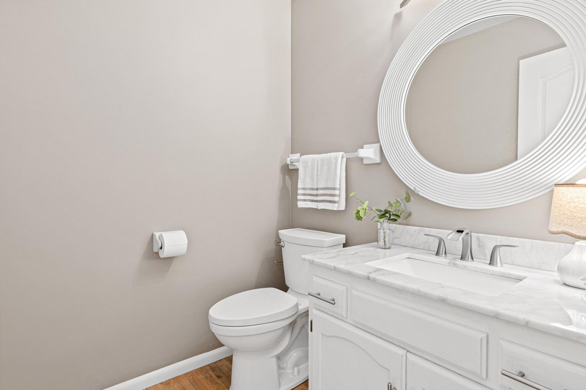 Half bath on main level with new paint and updates.