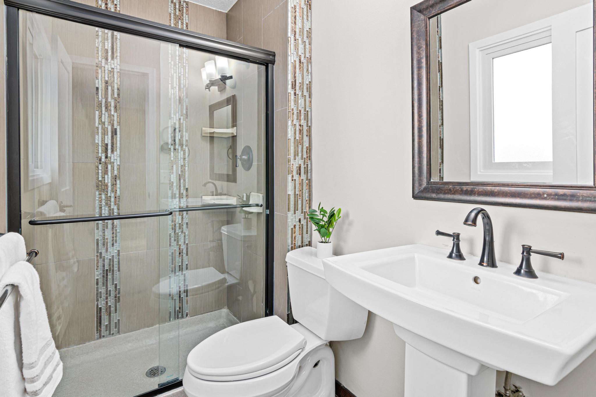 Updated en-suite bathroom featuring stylish finishes and a well-designed layout. Provides a private and comfortable space to complement the owner’s suite.