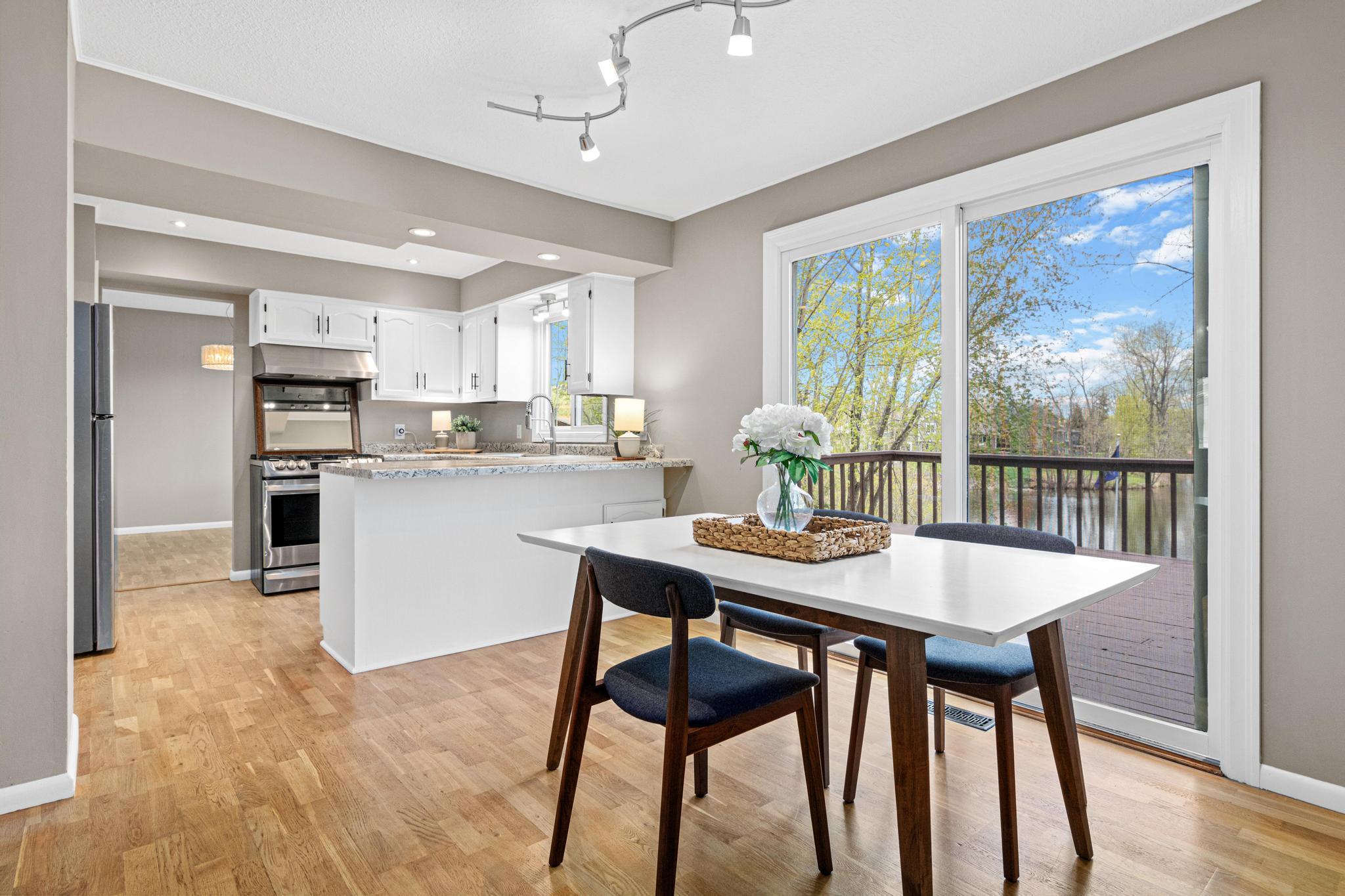 Convenient access to the deck makes it easy to extend dining and entertaining outdoors.