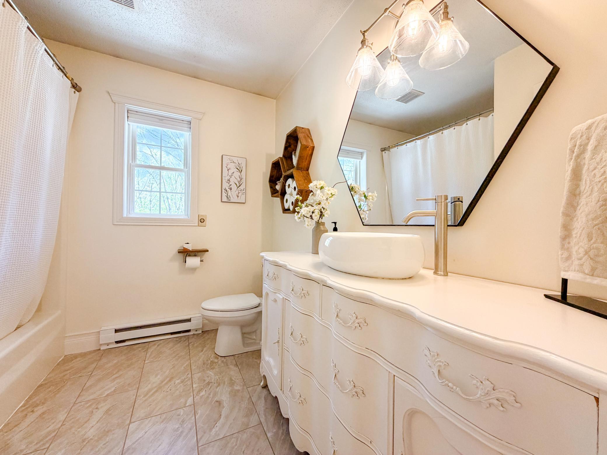 Main full bath off kitchen