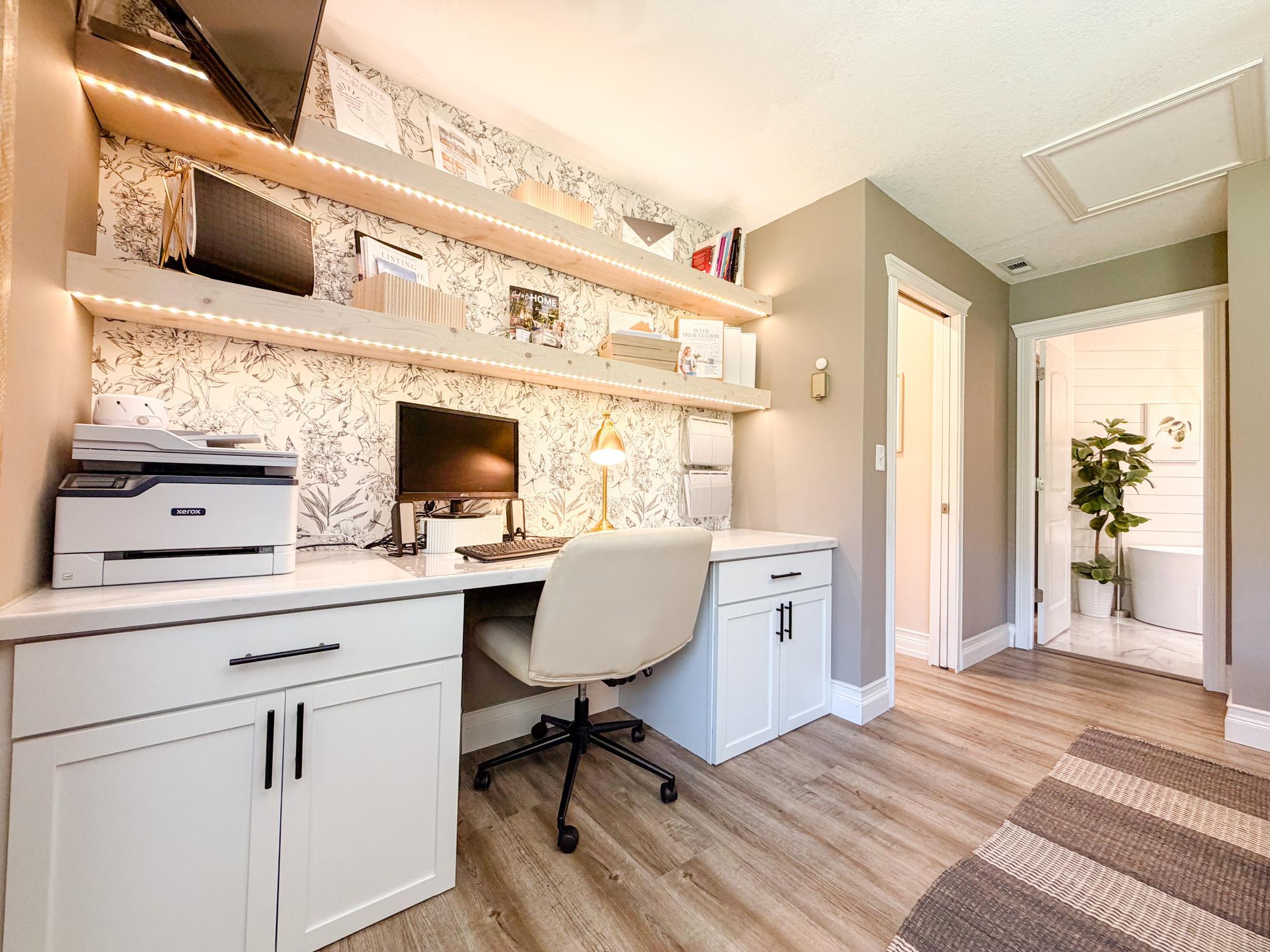 Primary suite with built in desk/tv area and LED lights
