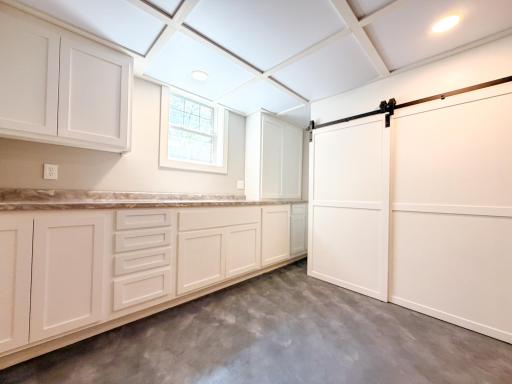 Built in upright freezer/fridge freezer and wet bar plumbed in.
