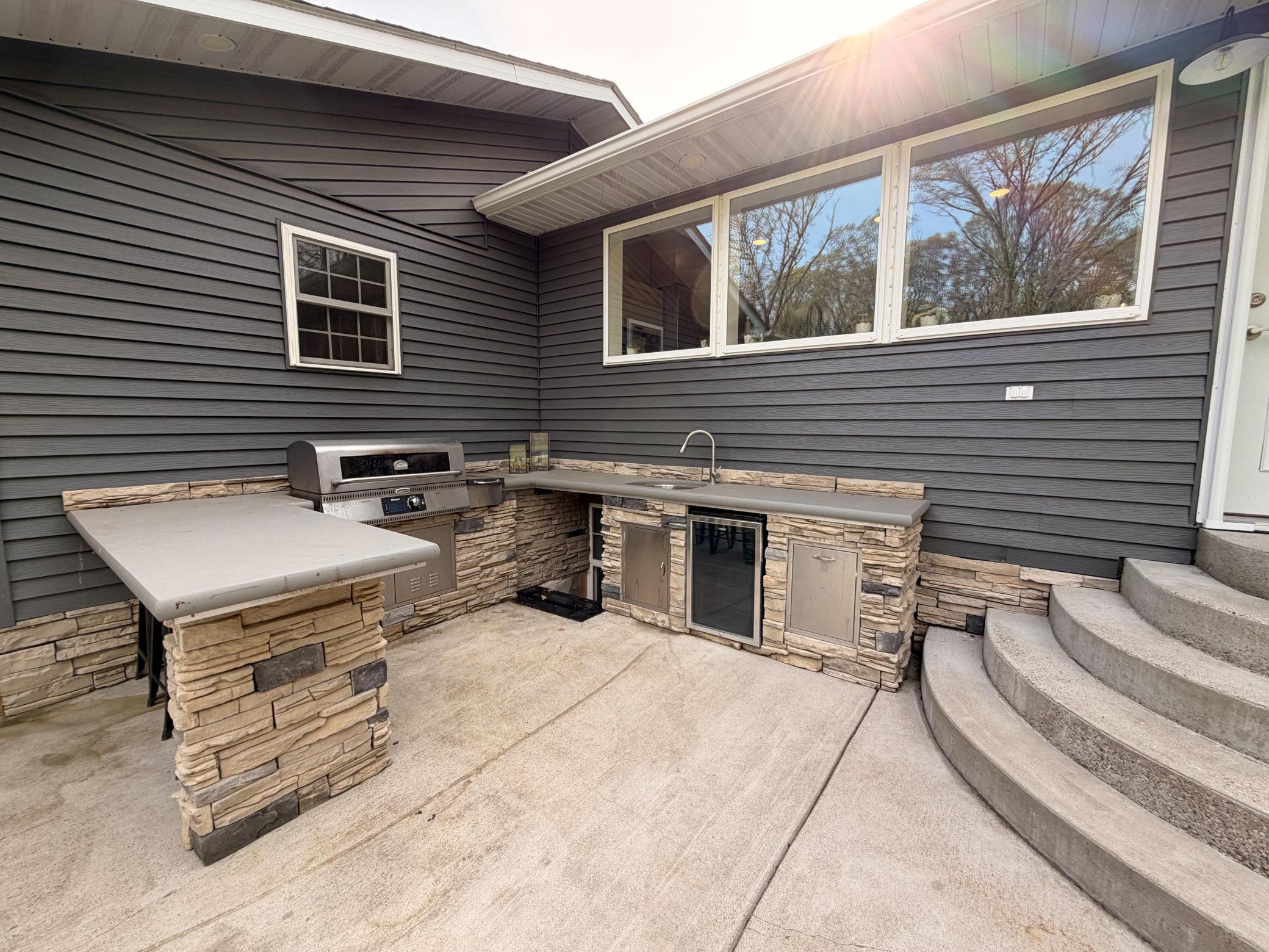 Back patio kitchen with smoker grill