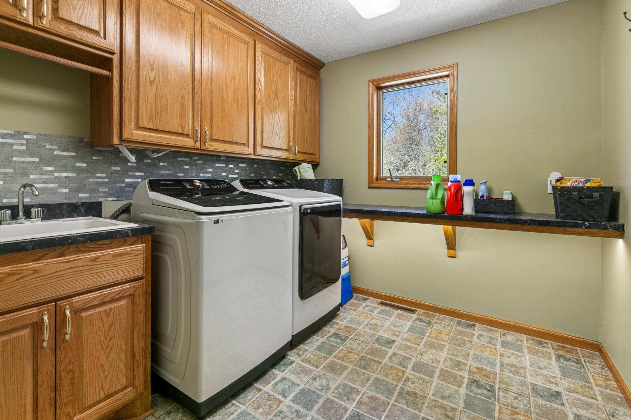 Main Level Laundry Room with Wash Sink