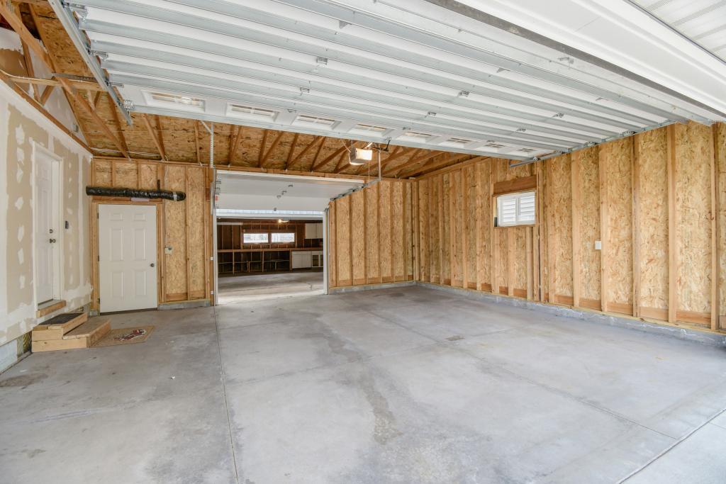 Attached 2 car garage with pass through to detached 2 car garage workshop!