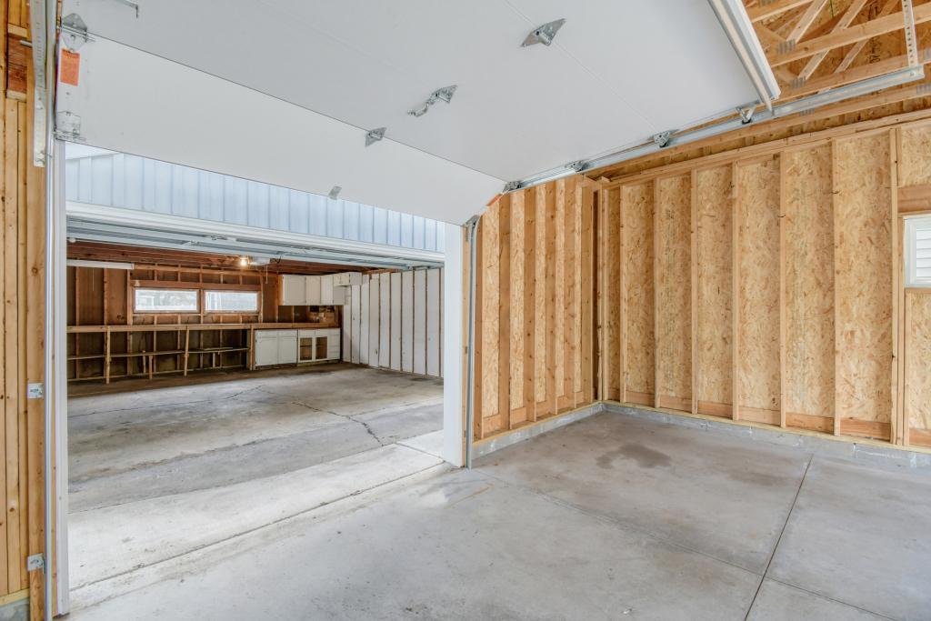 Attached 2 car garage with pass through to rear 2 car garage workshop!
