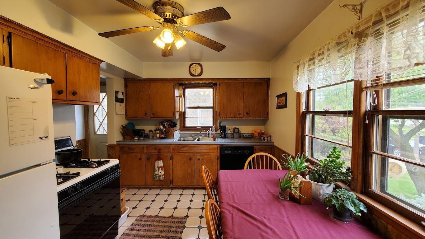 Kitchen has tile floor.