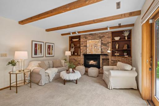 Multi-functional lower level offering a spacious layout, plush carpeting, and excellent natural light.