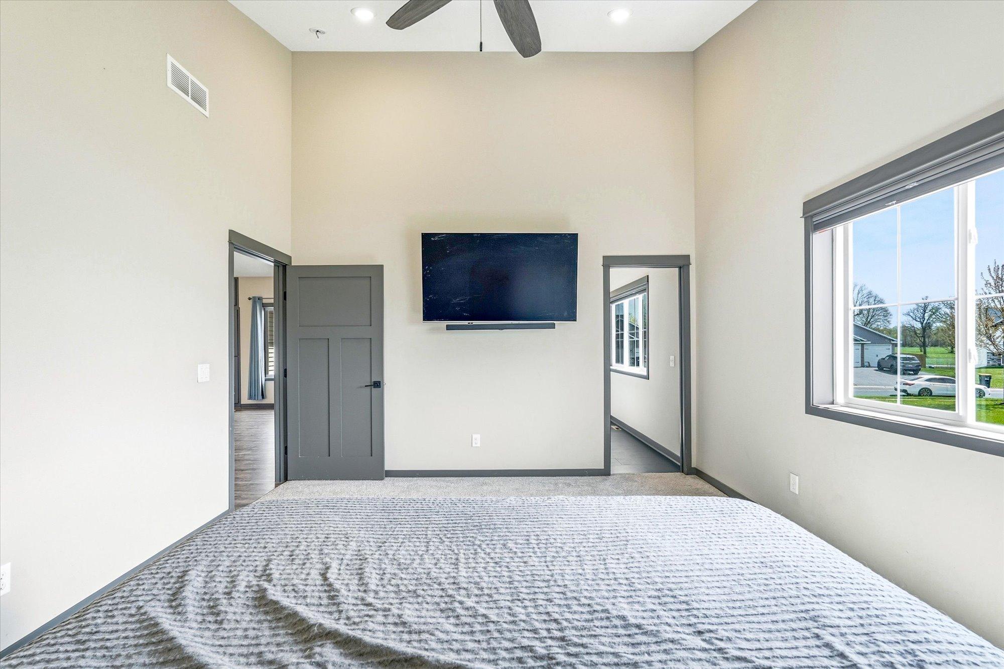Private primary suite offers generous room sizes, tall ceilings, and a peaceful retreat at the end of the day.