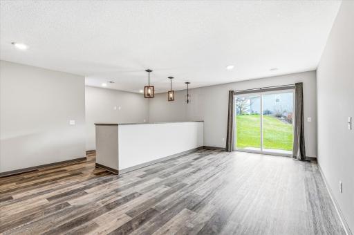 Expansive walkout lower level offers flexible living space with room for entertaining, hobbies, or a future game area.