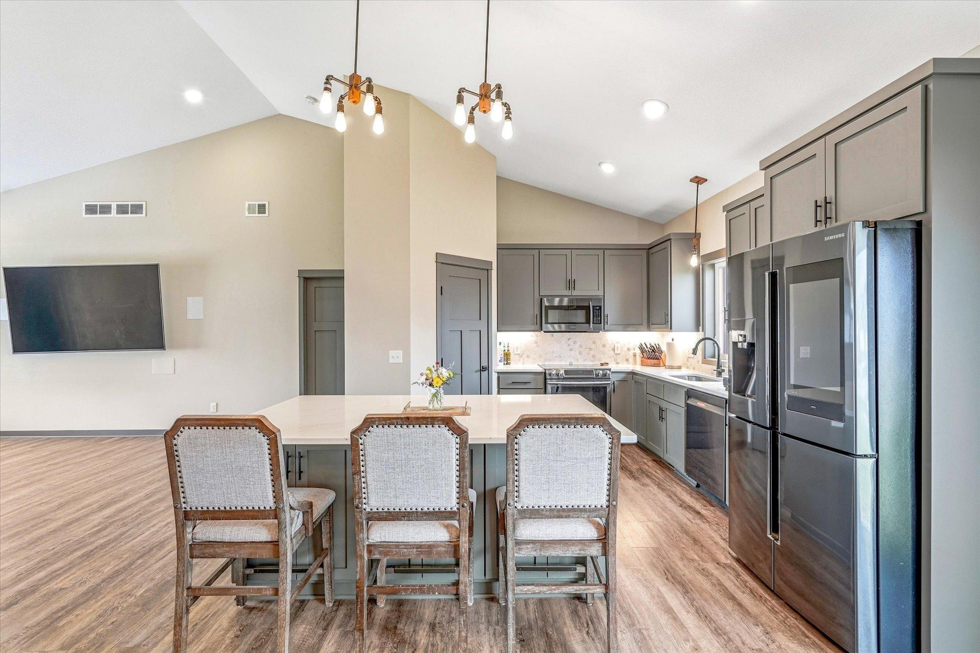 Open dining space conveniently located between the kitchen and living room, ideal for entertaining family and friends.