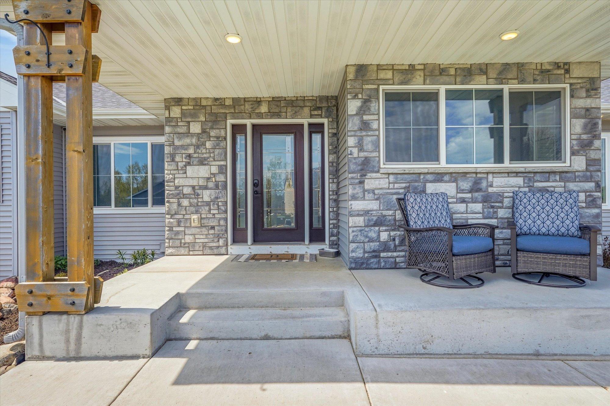 Enjoy your morning coffee or evening sunsets from the charming covered front porch.